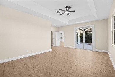 Reimagined and move-in ready, this waterfront home on an on The Legacy Golf and Tennis Club in Florida - for sale on GolfHomes.com, golf home, golf lot