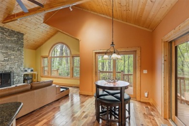 Nestled in the popular Holly Forest community of Sapphire, this on Sapphire National Golf Club in North Carolina - for sale on GolfHomes.com, golf home, golf lot