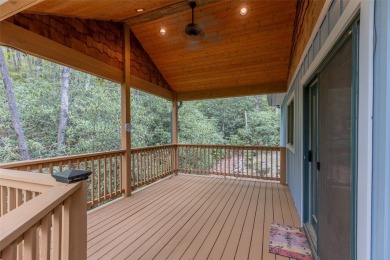Nestled in the popular Holly Forest community of Sapphire, this on Sapphire National Golf Club in North Carolina - for sale on GolfHomes.com, golf home, golf lot