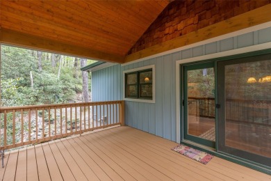Nestled in the popular Holly Forest community of Sapphire, this on Sapphire National Golf Club in North Carolina - for sale on GolfHomes.com, golf home, golf lot