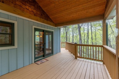 Nestled in the popular Holly Forest community of Sapphire, this on Sapphire National Golf Club in North Carolina - for sale on GolfHomes.com, golf home, golf lot