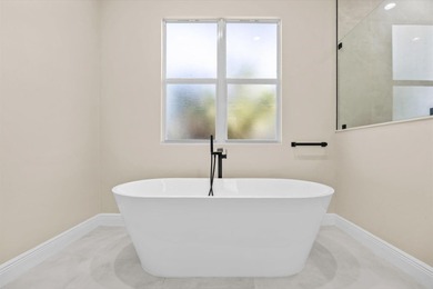 Reimagined and move-in ready, this waterfront home on an on The Legacy Golf and Tennis Club in Florida - for sale on GolfHomes.com, golf home, golf lot