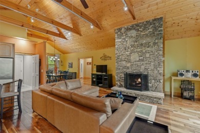 Nestled in the popular Holly Forest community of Sapphire, this on Sapphire National Golf Club in North Carolina - for sale on GolfHomes.com, golf home, golf lot