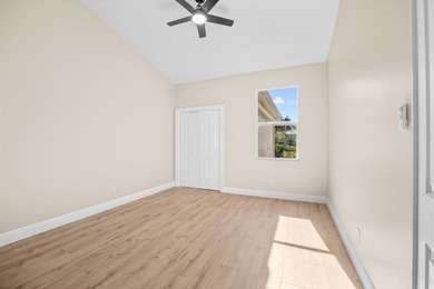 Reimagined and move-in ready, this waterfront home on an on The Legacy Golf and Tennis Club in Florida - for sale on GolfHomes.com, golf home, golf lot