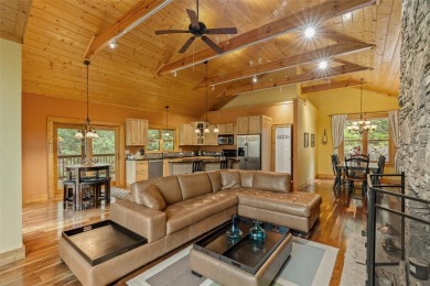 Nestled in the popular Holly Forest community of Sapphire, this on Sapphire National Golf Club in North Carolina - for sale on GolfHomes.com, golf home, golf lot