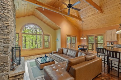 Nestled in the popular Holly Forest community of Sapphire, this on Sapphire National Golf Club in North Carolina - for sale on GolfHomes.com, golf home, golf lot