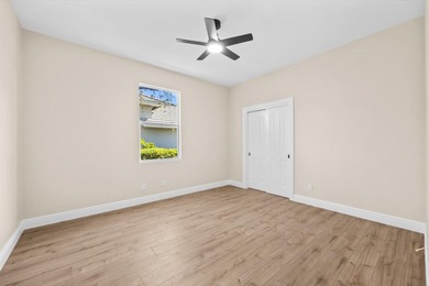 Reimagined and move-in ready, this waterfront home on an on The Legacy Golf and Tennis Club in Florida - for sale on GolfHomes.com, golf home, golf lot