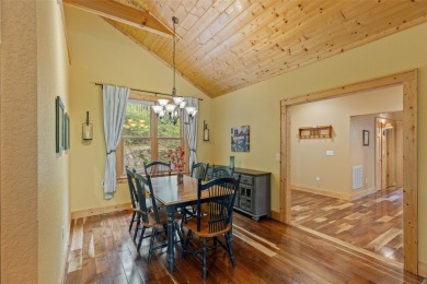 Nestled in the popular Holly Forest community of Sapphire, this on Sapphire National Golf Club in North Carolina - for sale on GolfHomes.com, golf home, golf lot