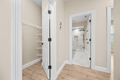 Reimagined and move-in ready, this waterfront home on an on The Legacy Golf and Tennis Club in Florida - for sale on GolfHomes.com, golf home, golf lot