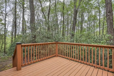 Nestled in the popular Holly Forest community of Sapphire, this on Sapphire National Golf Club in North Carolina - for sale on GolfHomes.com, golf home, golf lot