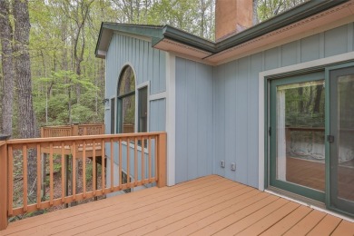 Nestled in the popular Holly Forest community of Sapphire, this on Sapphire National Golf Club in North Carolina - for sale on GolfHomes.com, golf home, golf lot