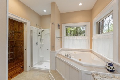 Nestled in the popular Holly Forest community of Sapphire, this on Sapphire National Golf Club in North Carolina - for sale on GolfHomes.com, golf home, golf lot