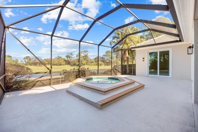 Reimagined and move-in ready, this waterfront home on an on The Legacy Golf and Tennis Club in Florida - for sale on GolfHomes.com, golf home, golf lot