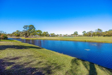 Reimagined and move-in ready, this waterfront home on an on The Legacy Golf and Tennis Club in Florida - for sale on GolfHomes.com, golf home, golf lot