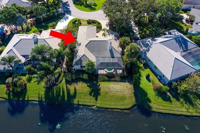 Reimagined and move-in ready, this waterfront home on an on The Legacy Golf and Tennis Club in Florida - for sale on GolfHomes.com, golf home, golf lot