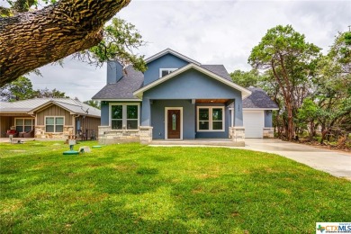 This brand-new, two-story Texas Hill country home boasts 3 on Canyon Lake Golf Club in Texas - for sale on GolfHomes.com, golf home, golf lot