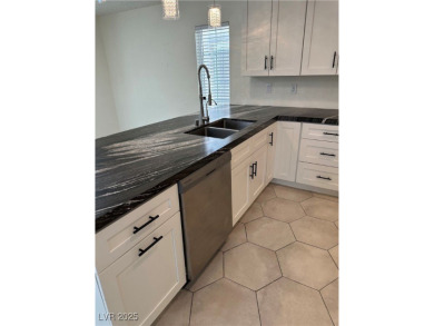 Discover this stunning, renovated home featuring modern quartz on Desert Rose Golf Course in Nevada - for sale on GolfHomes.com, golf home, golf lot