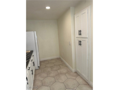 Discover this stunning, renovated home featuring modern quartz on Desert Rose Golf Course in Nevada - for sale on GolfHomes.com, golf home, golf lot