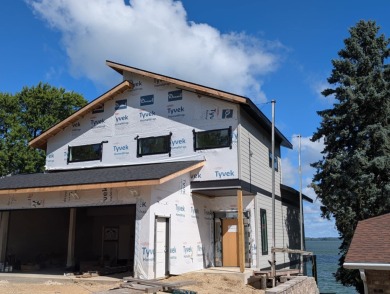 Welcome to Lake Life AND Golf Life, a stunning new construction on Stoughton Country Club in Wisconsin - for sale on GolfHomes.com, golf home, golf lot