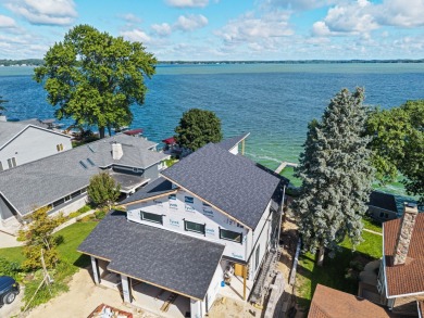 Welcome to Lake Life AND Golf Life, a stunning new construction on Stoughton Country Club in Wisconsin - for sale on GolfHomes.com, golf home, golf lot