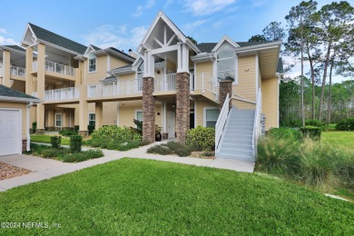 This super clean and updated 2nd floor end unit has lots of on Slammer and Squire Golf Course in Florida - for sale on GolfHomes.com, golf home, golf lot