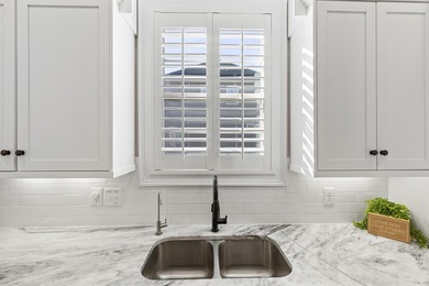 Located in the highly sought-after Bartram Trail, this on Bartram Trail Golf Club in Georgia - for sale on GolfHomes.com, golf home, golf lot