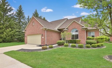 Situated on a prime lot in the exclusive Orchards Golf Course on The Orchards Golf Club in Michigan - for sale on GolfHomes.com, golf home, golf lot