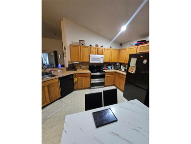 Welcome to this 4-bedroom & 3 full bathroom home located in the on Remington Golf Club in Florida - for sale on GolfHomes.com, golf home, golf lot