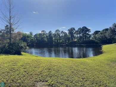 Reduced Price! This stunning 3-bedroom, 2-bath home in a on St. Lucie Trail Golf Club in Florida - for sale on GolfHomes.com, golf home, golf lot