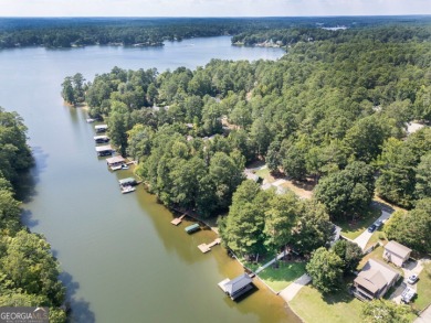 Lakefront Home on Large Level Lot with Covered Dock on Turtle Cove Golf Course in Georgia - for sale on GolfHomes.com, golf home, golf lot