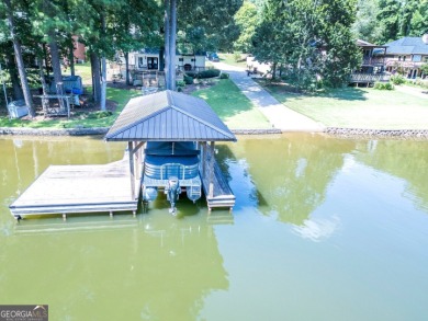 Lakefront Home on Large Level Lot with Covered Dock on Turtle Cove Golf Course in Georgia - for sale on GolfHomes.com, golf home, golf lot