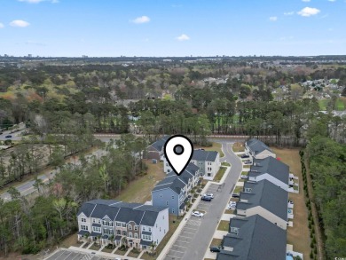 Modern Coastal Living! This elegant three-story townhome in the on Arrowhead Country Club in South Carolina - for sale on GolfHomes.com, golf home, golf lot