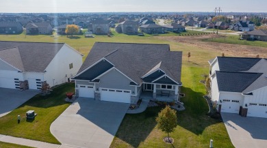 Welcome to a luxurious escape that effortlessly combines on Otter Creek Golf Course in Iowa - for sale on GolfHomes.com, golf home, golf lot