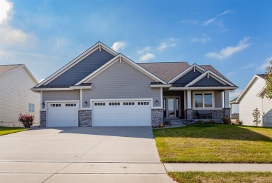 Welcome to a luxurious escape that effortlessly combines on Otter Creek Golf Course in Iowa - for sale on GolfHomes.com, golf home, golf lot