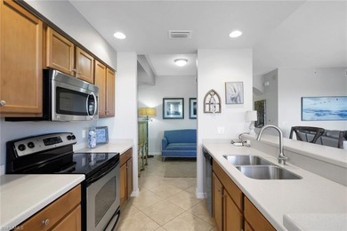 Experience effortless country club living in this beautifully on Heritage Bay Golf Course in Florida - for sale on GolfHomes.com, golf home, golf lot