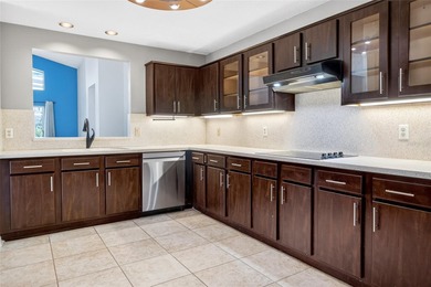 One or more photo(s) has been virtually staged. Tucked into a on Country Club of Mount Dora in Florida - for sale on GolfHomes.com, golf home, golf lot