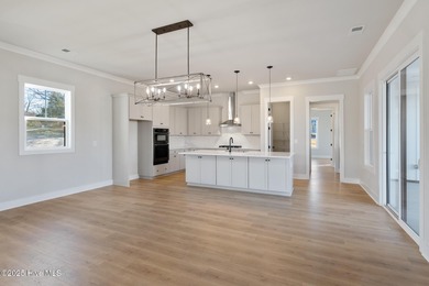 Introducing The Emmy - what a perfect name for a luxury on Brunswick Plantation and Golf Resorts in North Carolina - for sale on GolfHomes.com, golf home, golf lot