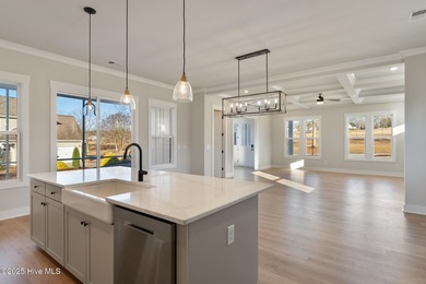 Introducing The Emmy - what a perfect name for a luxury on Brunswick Plantation and Golf Resorts in North Carolina - for sale on GolfHomes.com, golf home, golf lot