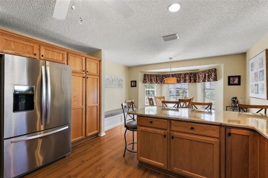Located in the desirable Village of Sunset Pointe, this updated on The Links of Spruce Creek in Florida - for sale on GolfHomes.com, golf home, golf lot