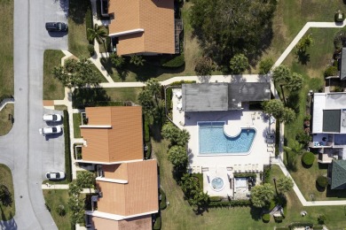 Rarely available 3 bedroom/3 bath ONE FLOOR villa in the Villas on Santa Lucia River Club in Florida - for sale on GolfHomes.com, golf home, golf lot