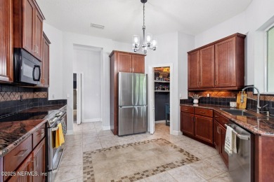 Custom-Built Home with Flexible Layout & Designer Finishes. This on Magnolia Point Golf and Country Club in Florida - for sale on GolfHomes.com, golf home, golf lot