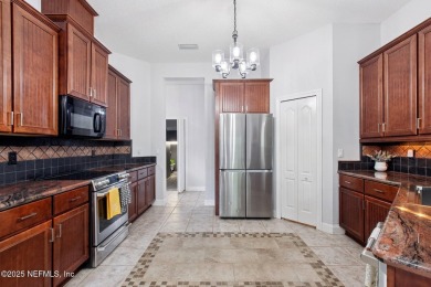 Custom-Built Home with Flexible Layout & Designer Finishes. This on Magnolia Point Golf and Country Club in Florida - for sale on GolfHomes.com, golf home, golf lot