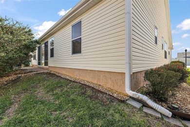 Located in the desirable Village of Sunset Pointe, this updated on The Links of Spruce Creek in Florida - for sale on GolfHomes.com, golf home, golf lot
