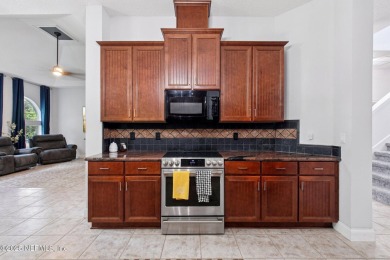 Custom-Built Home with Flexible Layout & Designer Finishes. This on Magnolia Point Golf and Country Club in Florida - for sale on GolfHomes.com, golf home, golf lot