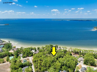 Nestled in the highly sought-after waterfront section of Rayburn on Rayburn Country Club in Texas - for sale on GolfHomes.com, golf home, golf lot