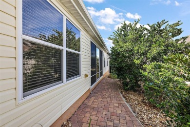 Located in the desirable Village of Sunset Pointe, this updated on The Links of Spruce Creek in Florida - for sale on GolfHomes.com, golf home, golf lot