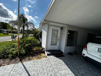 This home features newly painted walls and ceilings, new carpets on Whisperwood Golf Course in Florida - for sale on GolfHomes.com, golf home, golf lot