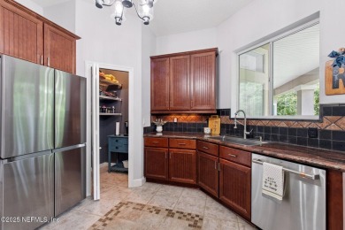Custom-Built Home with Flexible Layout & Designer Finishes. This on Magnolia Point Golf and Country Club in Florida - for sale on GolfHomes.com, golf home, golf lot