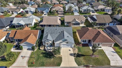 Located in the desirable Village of Sunset Pointe, this updated on The Links of Spruce Creek in Florida - for sale on GolfHomes.com, golf home, golf lot