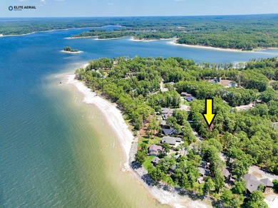 Nestled in the highly sought-after waterfront section of Rayburn on Rayburn Country Club in Texas - for sale on GolfHomes.com, golf home, golf lot